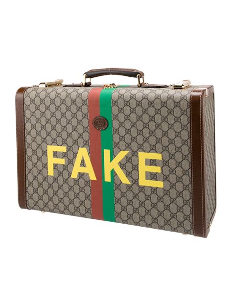 gucci not fake line|knock off gucci luggage set.